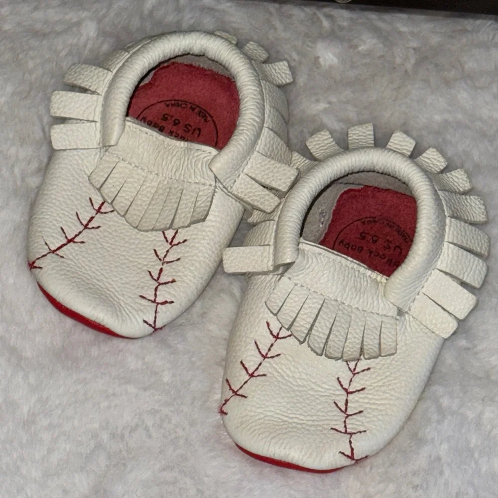BirdRock Baby Home Run genuine leather baby moccasins with a baseball design.